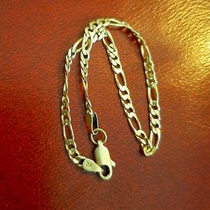 14k yellow gold Figaro bracelet
